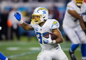 Austin Ekeler carries the ball